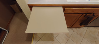 Flat pull-out cutting board for prep